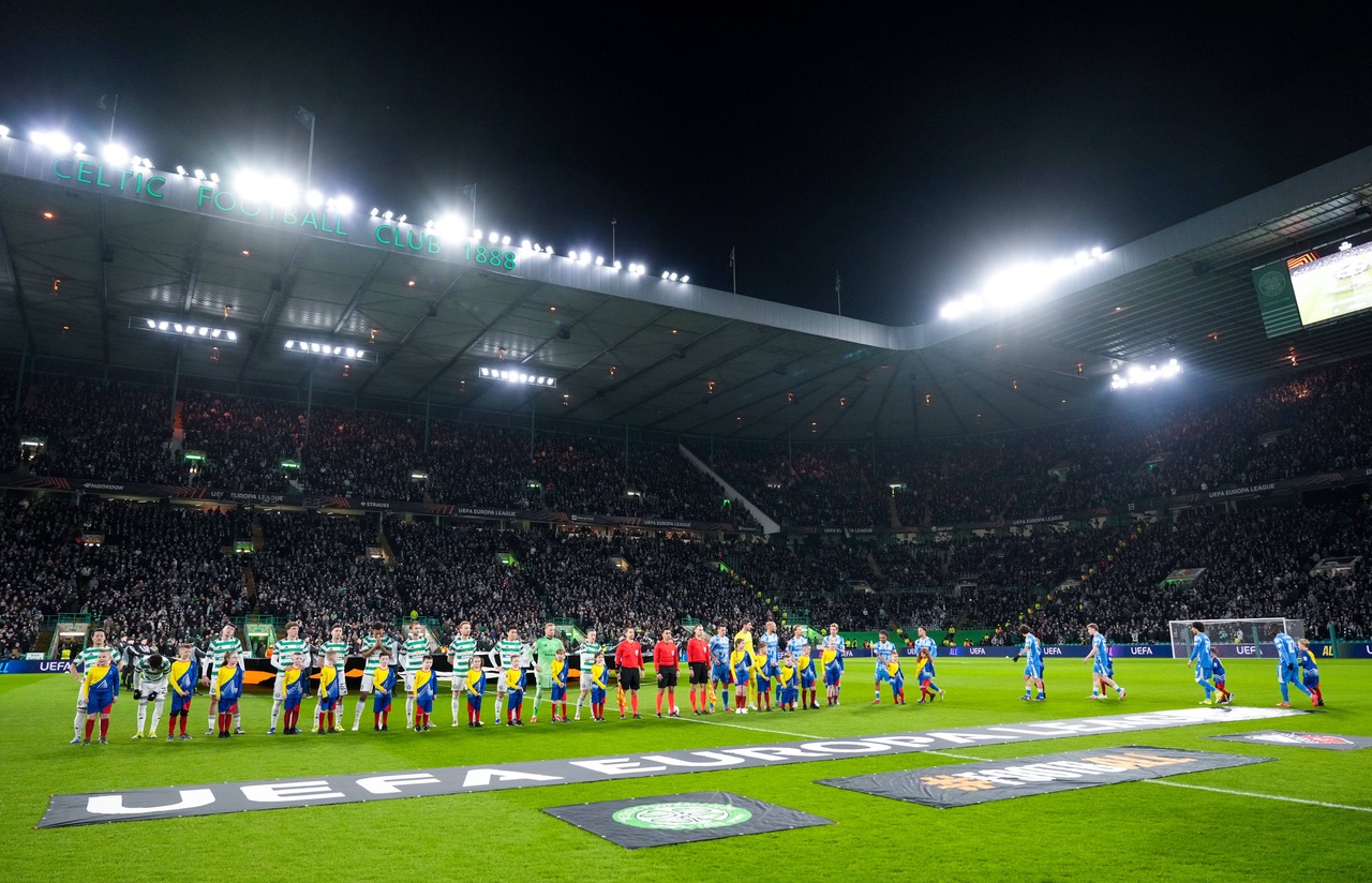 Celtic and Utrecht players shake hands before kick off.