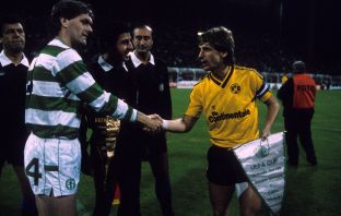 Roy Aitken (Celtic) and Frank Mill (BVB) shake hands before the Dortmund v Celtic second leg match in 1987.