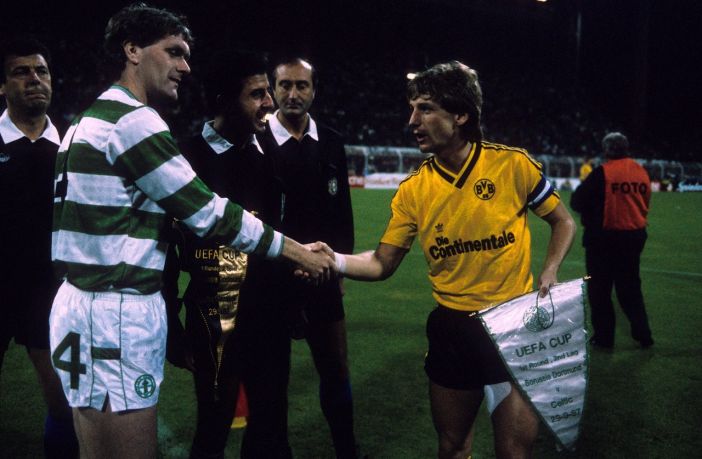 Roy Aitken (Celtic) and Frank Mill (BVB) shake hands before the Dortmund v Celtic second leg match in 1987.