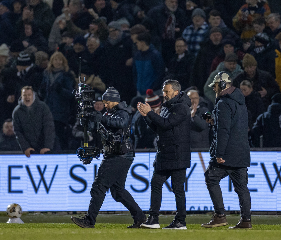 erek McInnes applauds the fans after the final whistle