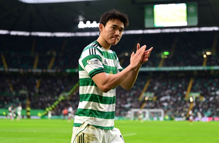 Yang of Celtic applauds the crowd