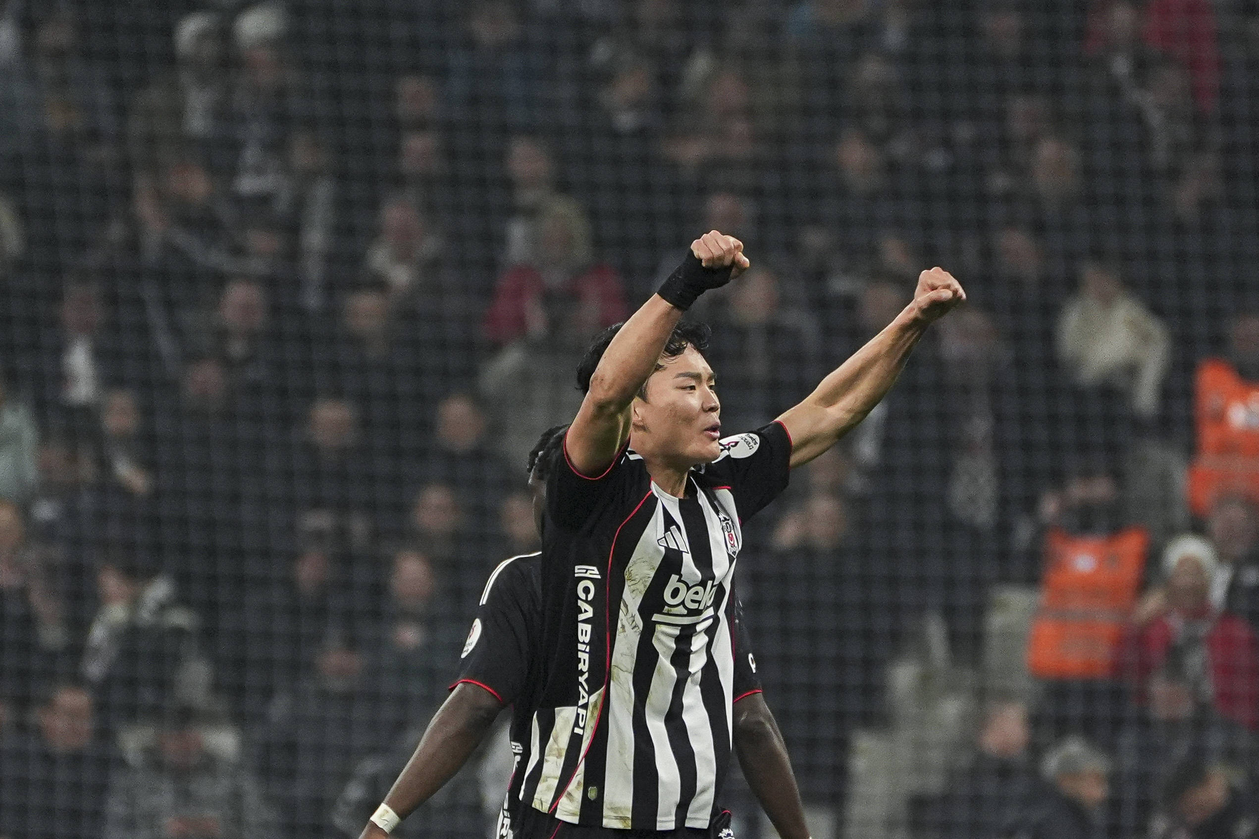 Hyeon-Gyu Oh of Besiktas celebrates 