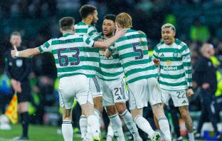 Alex Oxlaide-Chamberlain celebrates