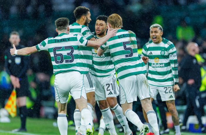 Alex Oxlaide-Chamberlain celebrates