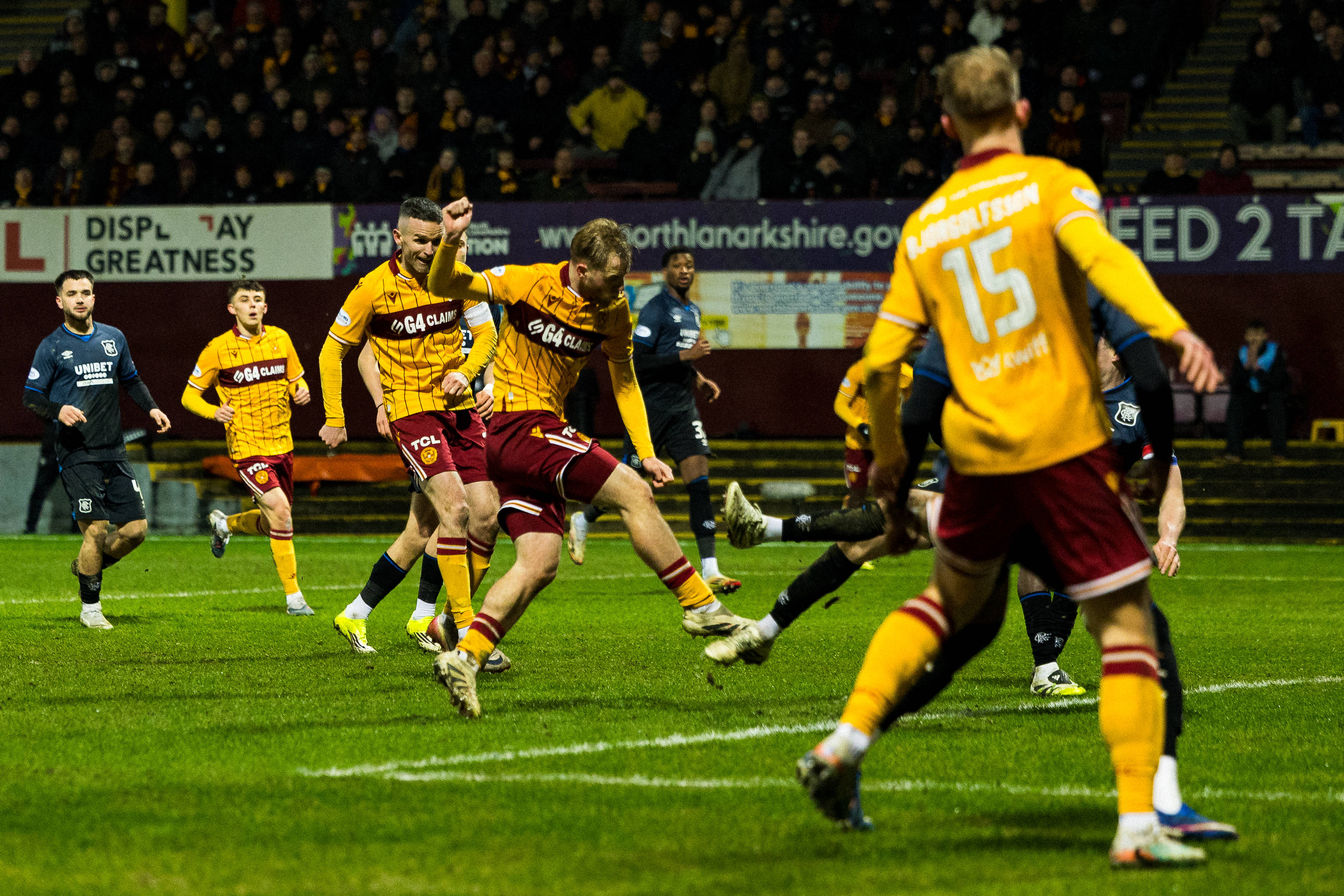 Stephen Welsh of Motherwell scores