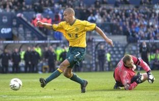 Henrik Larsson scores as Celtic win the League Cup Final in 2001.