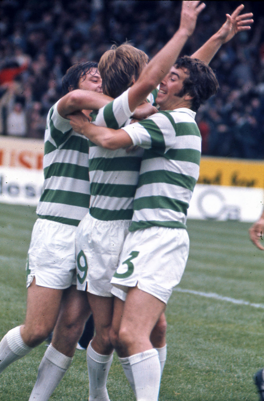 Kenny Dallglish celebrates with Pat McCluskey and Andy Lynch. August 1975.