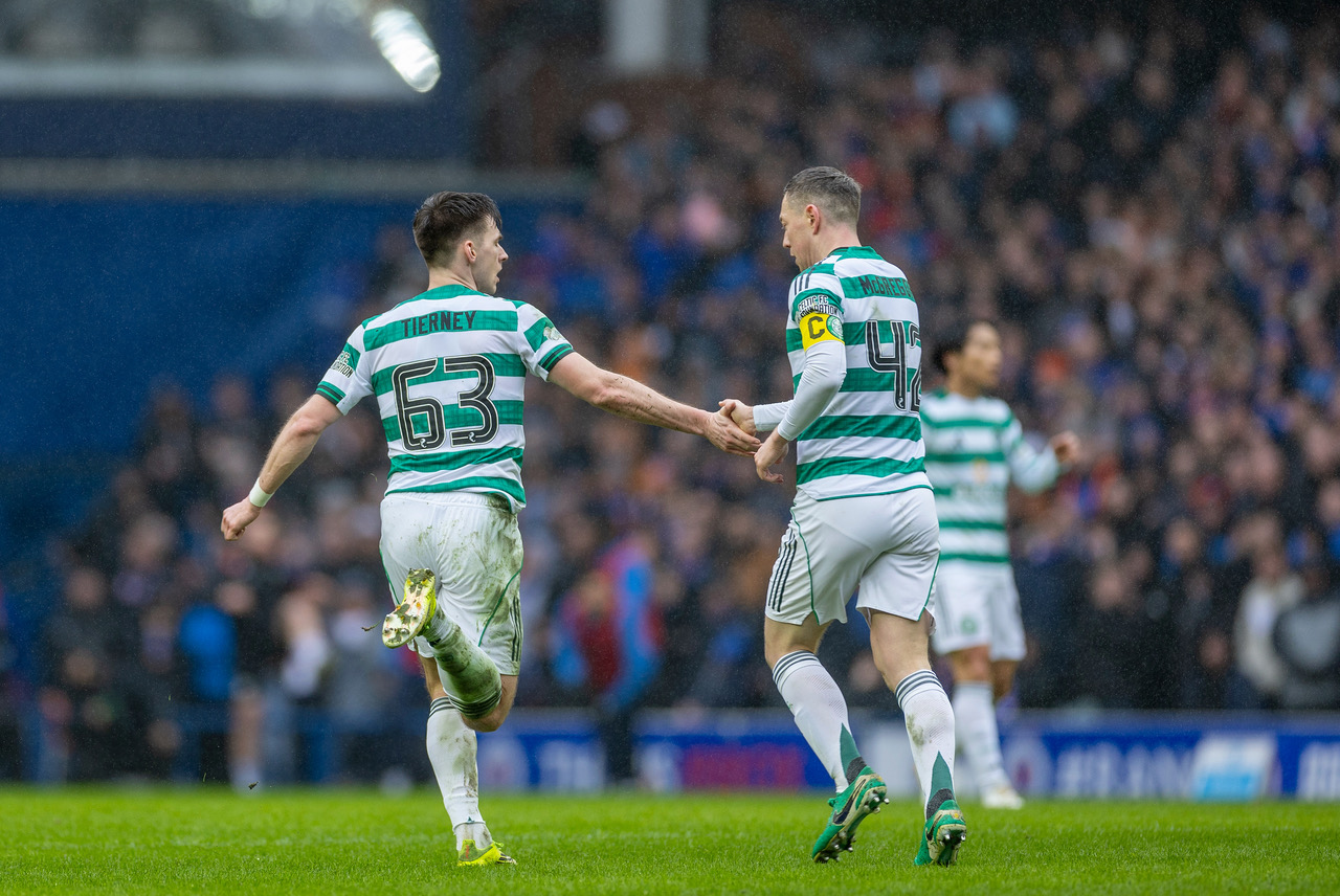 Kieran Tierney celebrates   with Callum McGregor 