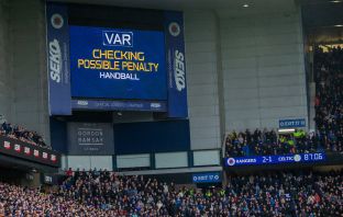 VAR Checking Possible Penalty on the screens at Ibrox