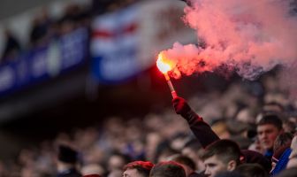 Rangers fans with a pyrotechnic