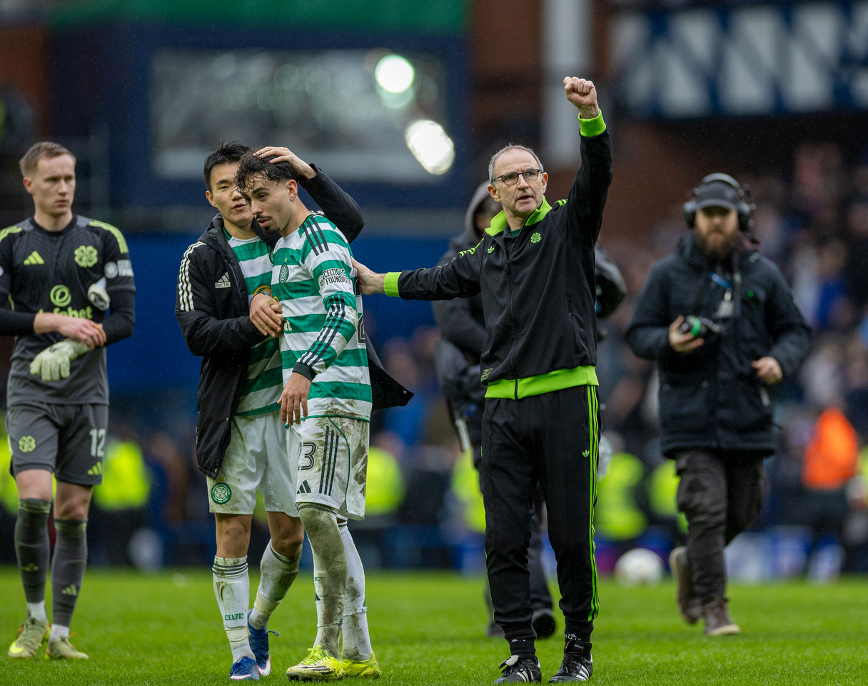Martin O'Neill applauds the Celtic support