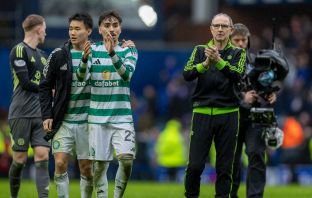 Martin O'Neill applauds the Celtic support