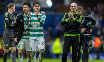 Martin O'Neill applauds the Celtic support