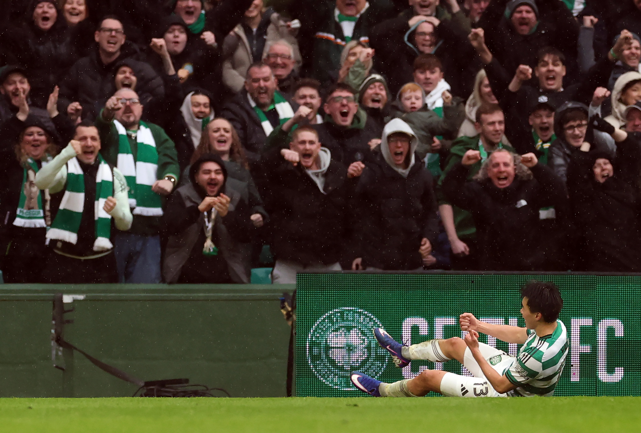 Yang celebrates scoring Celtic's third goal against Motherwell