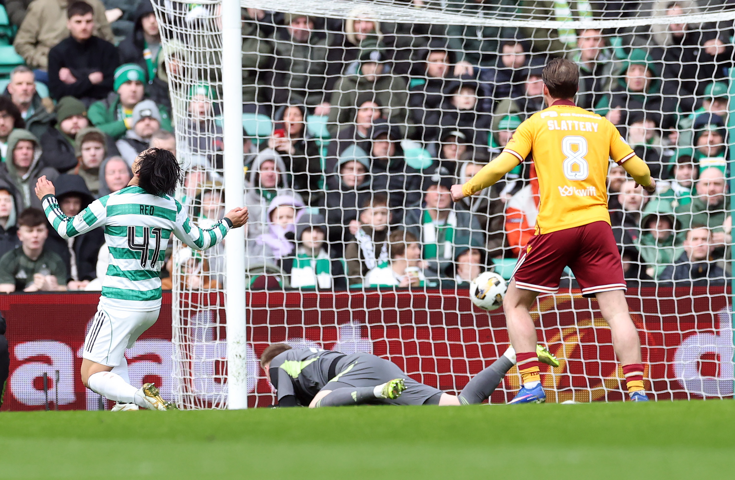Viljami Sinisalo of Celtic is beaten 