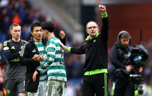 Martin O'Neill, Manager of Celtic acknowledges the fans