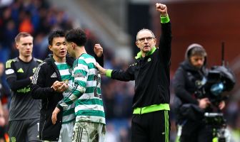 Martin O'Neill, Manager of Celtic acknowledges the fans