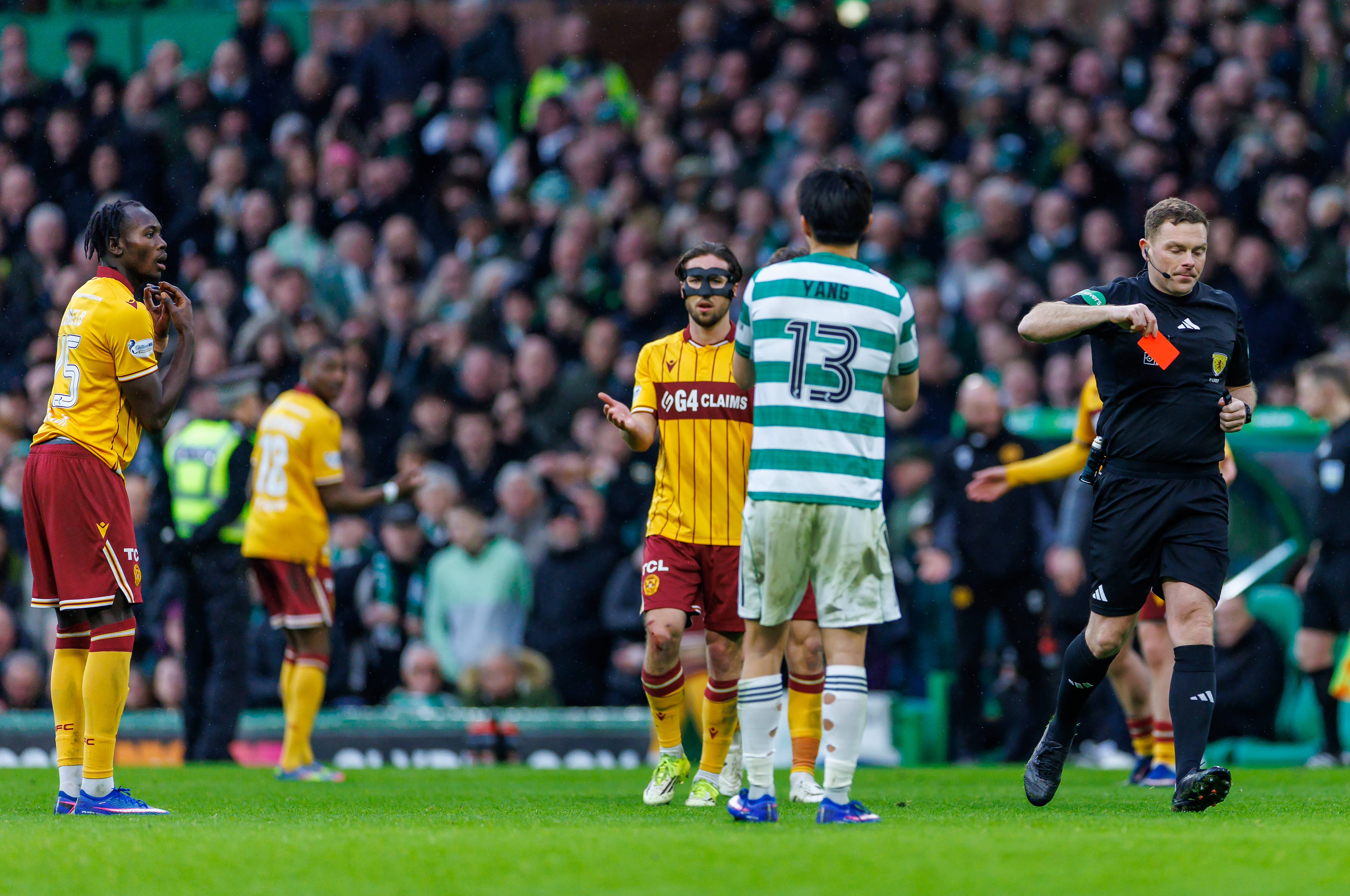 Emmanuel Longelo receives a red card from John Beaton after a VAR review