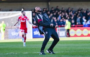 Crawley Town head coach Colin Kazim-Richards celebrates