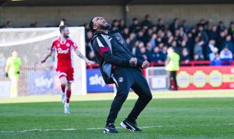 Crawley Town head coach Colin Kazim-Richards celebrates
