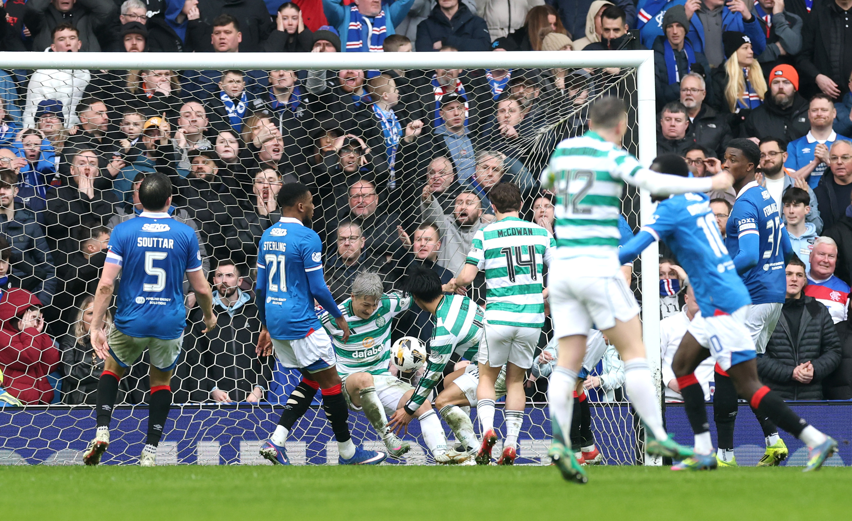 Reo Hatate of Celtic scores