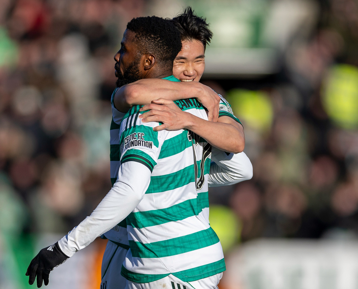 Kelechi Iheanacho celebrates with Yang