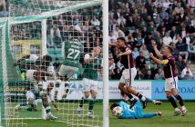 Warren O'Hora of Hibernian scores an own goal