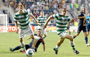 Celtic FC defenders Glenn Loovens ( 22) Milan Misun ( 15)