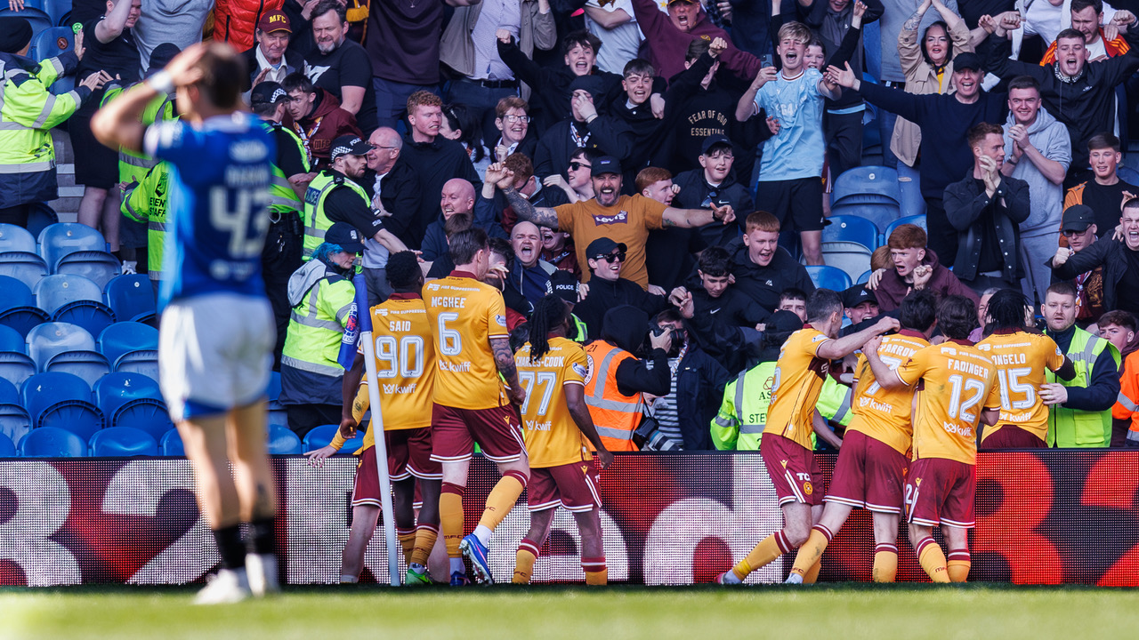 Motherwell celebrate scoring a late winner at Ibrox