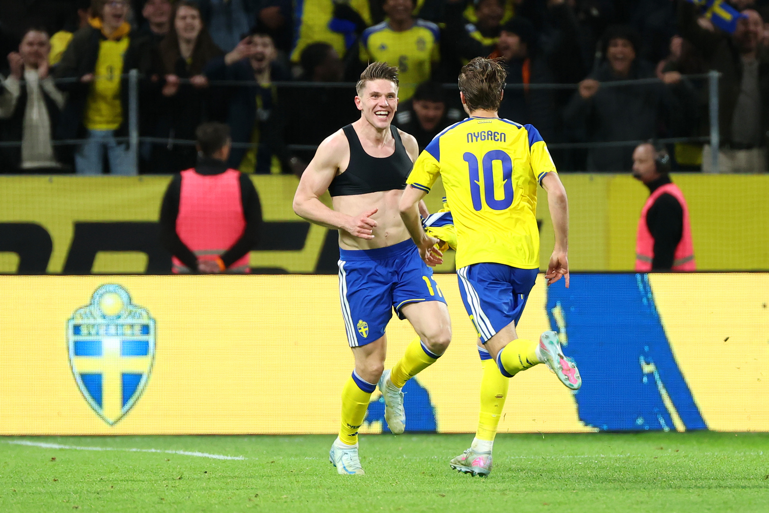 Viktor Gyoekeres of Sweden celebrates victory with teammate Benjamin Nygren 