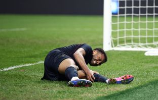 Auston Trusty of United States seems to have picked up an injury
