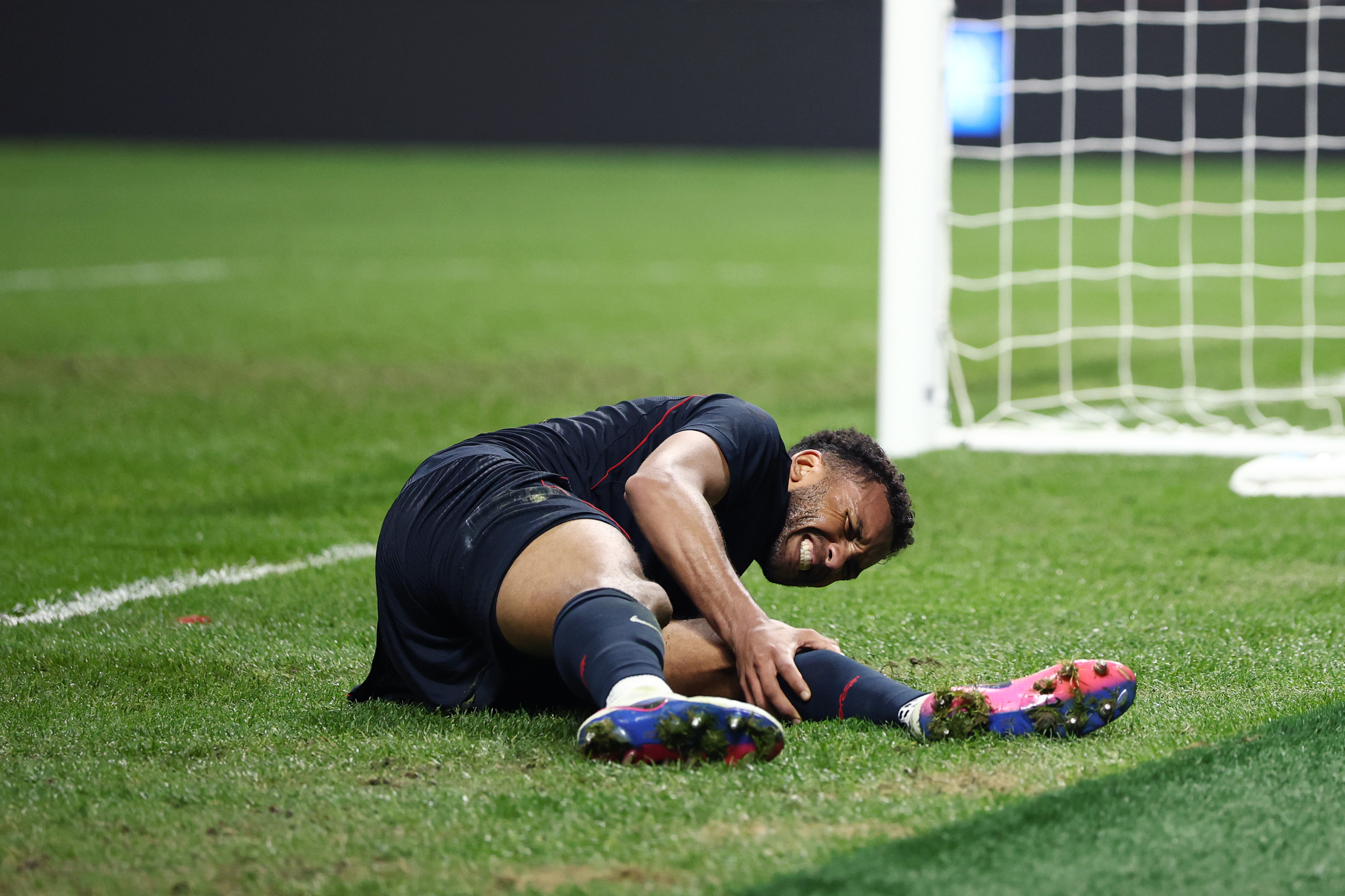 Auston Trusty of United States seems to have picked up an injury