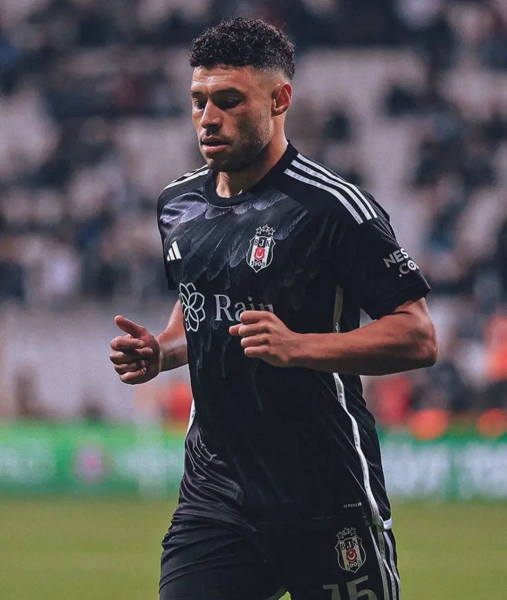 Alex Oxlade-Chamberlain in a Besiktas JK black jersey during a match.