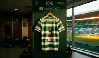 Celtic FC jersey in iconic green hoops hanging in stadium dressing room with natural lighting