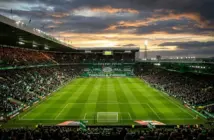 Celtic Park stadium under floodlights before crucial title decider match at Paradise