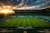 Celtic Park stadium at sunset with empty pitch awaiting Champions League preparation and summer rebuild