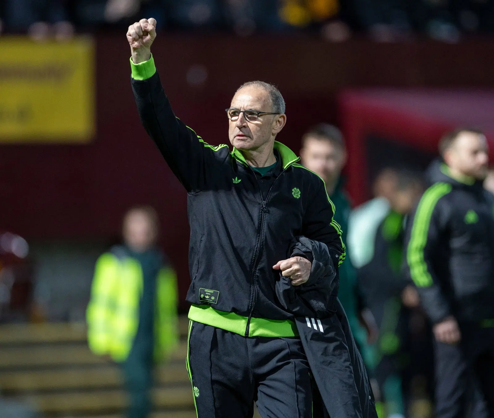 Martin O'Neill celebrating with a raised fist while managing Celtic.