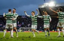 Celtic players celebrate goal during 3-2 away victory over Motherwell in Scottish Premiership title race