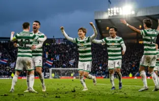 Celtic players celebrate goal during 3-2 away victory over Motherwell in Scottish Premiership title race