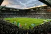 Celtic Park stadium filled with passionate supporters celebrating championship victory