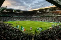Celtic Park stadium filled with passionate supporters celebrating championship victory