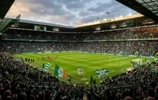 Celtic Park stadium filled with passionate supporters celebrating championship victory
