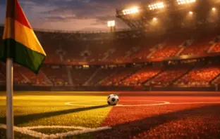 Empty floodlit stadium pitch corner view at dusk, gold and burgundy lighting, match ball on centre spot, sharp shadows.
