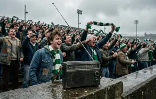 Vintage transistor radio on football terrace with Celtic supporters in background, May 1986