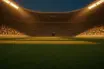 Floodlit stadium pitch at dusk with packed stands in Senegal green-gold and Iraq red-white colours.