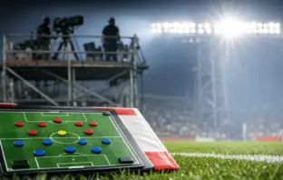 Tactical pitch diagram on analyst desk with stadium gantry and bright floodlights in background; Group Stage match preview setup