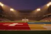 Floodlit World Cup stadium pitch at dusk with packed stands, dramatic shadows, and golden-hour atmospheric lighting.