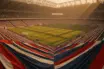 Elevated stadium corner view showing coloured bunting and floodlit pitch at dusk, group-stage atmosphere.