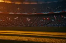 Floodlit quarter-final stadium at dusk with dramatic lighting, packed stands, and golden-hour atmosphere during World Cup competition.