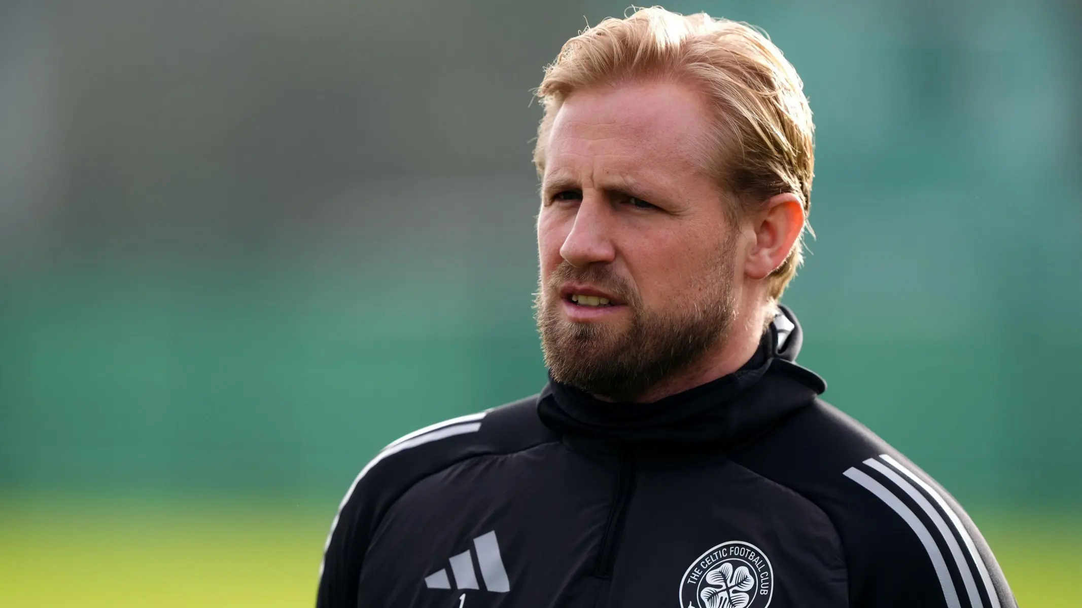 Close-up portrait of Kasper Schmeichel wearing a black Celtic FC training top